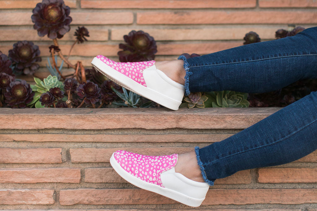Samaira shoes being worn behind brick