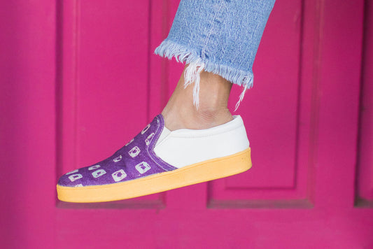 Tara shoe being worn by female in front of bright colored door